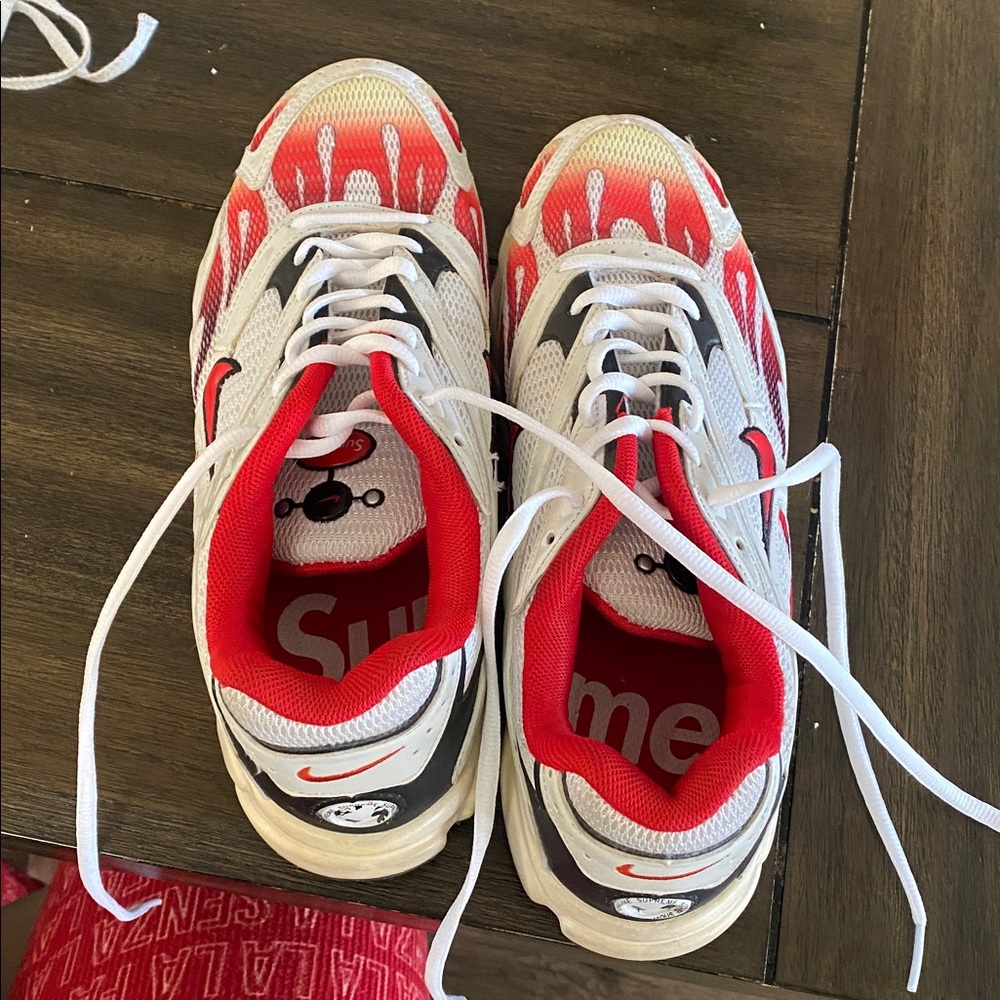 Nike Red and White Supreme Collaboration Sneaker
LIMITED EDITION